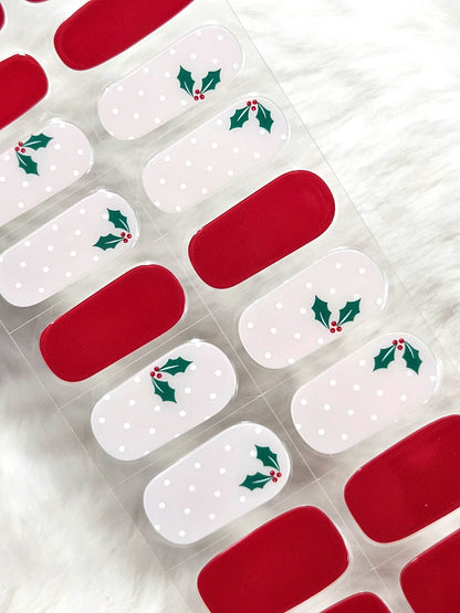 Sada gélových vianočných nechtov v červenej a bielej farbe s cezmínou.