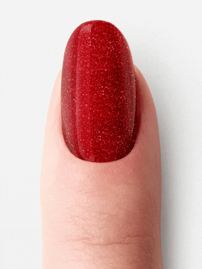 Gélové vianočné nechty Red Carpet v červenej, nude a striebornej farbe.