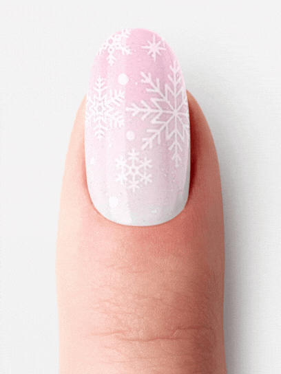 Ružový gélový vianočný necht Flowflake Kiss s bielymi snehovými vločkami.
